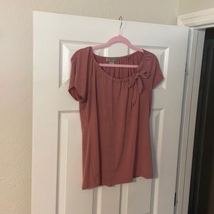 Pink blouse with bow